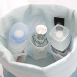 Trousse de Toilette Ronde Travel™