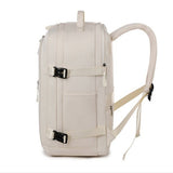 Vue de profil du sac à dos cabine femme beige avec sangles de compression